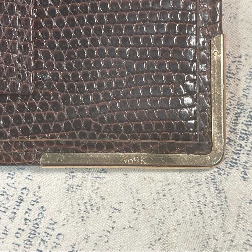 Smythson Antique lizard skin passport wallet with gold corners